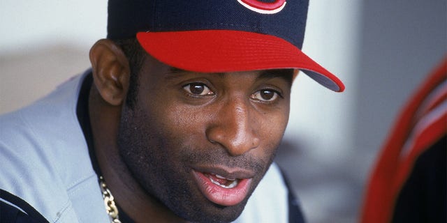 Deion Sanders on the bench for the Cincinnati Reds