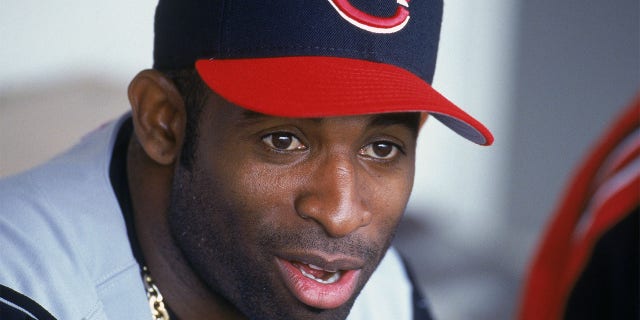 Deion Sanders on the bench for the Cincinnati Reds