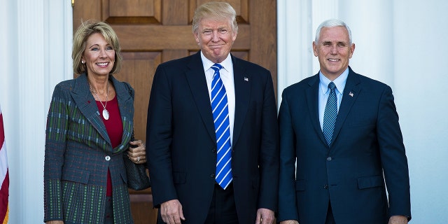 Betsy DeVos, Donald Trump, Mike Pence