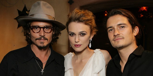 Johnny Depp, Keira Knightley and Orlando Bloom at the premiere of Pirates of the Caribbean 