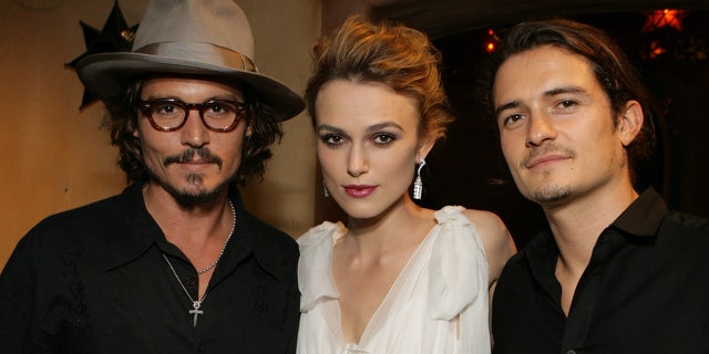 Johnny Depp, Keira Knightley and Orlando Bloom at the premiere of Pirates of the Caribbean 