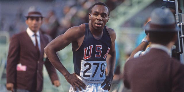 Jim Hines after winning gold at the 1968 Olympics