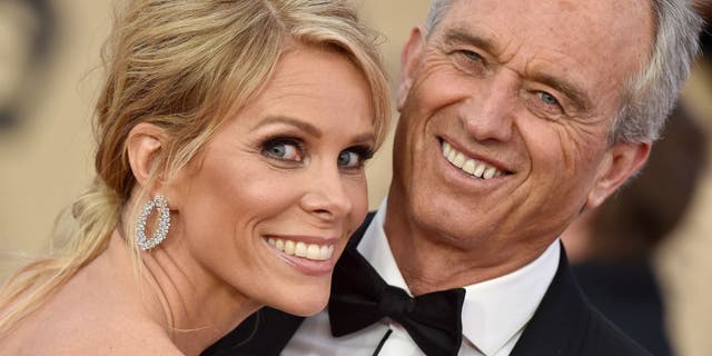 rfk jr.  and cheryl hines beaming on the red carpet