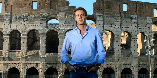 Emanuele Filiberto wearing a light blue shirt