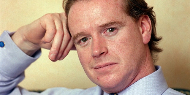 A close-up of James Hewitt wearing a blue shirt