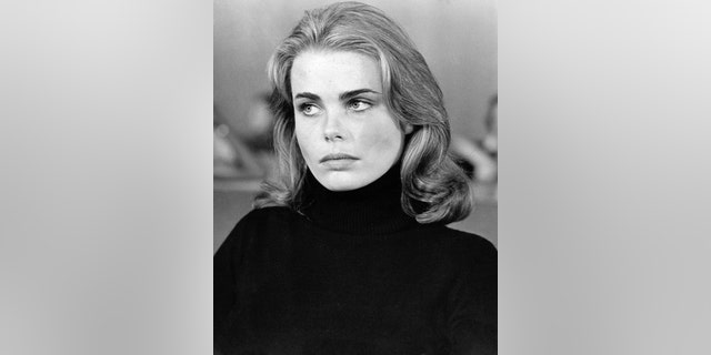 Margaux Hemingway wearing a black turtleneck