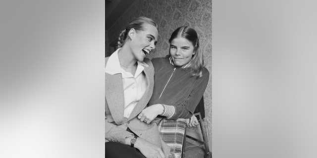 Margaux and Mariel Hemingway sharing a healthfelt moment in a black and white photo