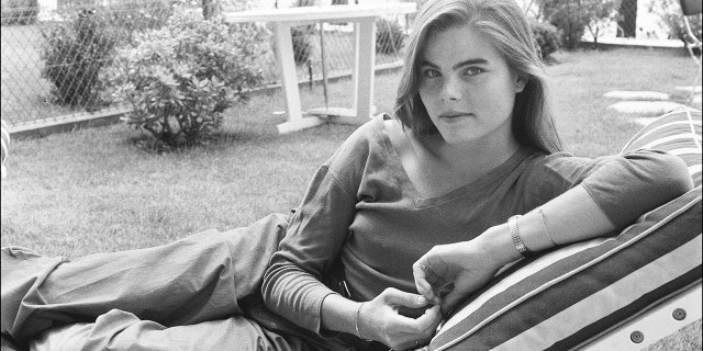 Mariel Hemingway lounging in a black and white photo