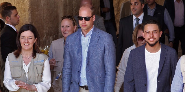 Prince William in a blue blazer and light blue shirt