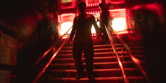 Zak Bagans going down the stairs of the Comedy Store