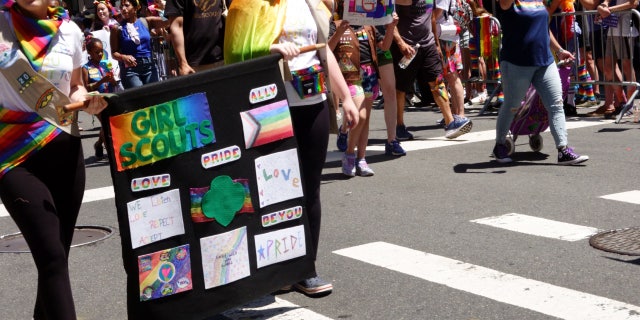 Girl Scouts marching in NYC pride parade