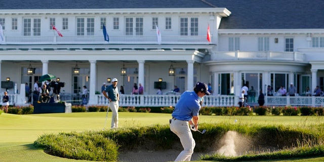 Gordon Sargent swings from the bunker