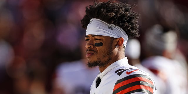 Greg Newsome II stares on field