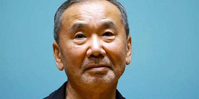 Haruki Murakami poses for picture