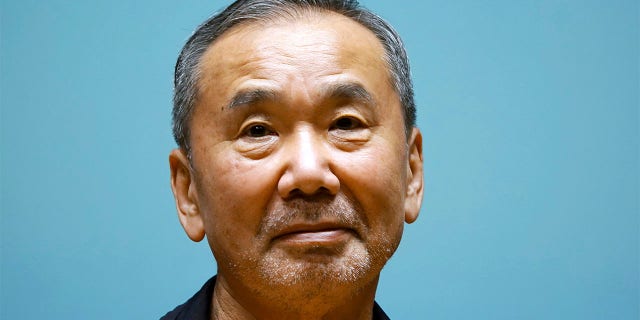 Haruki Murakami poses for picture