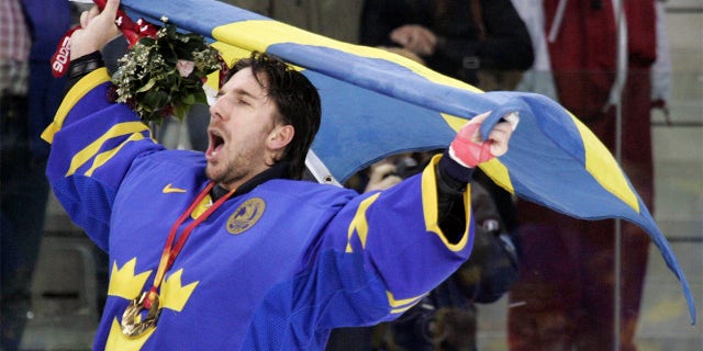 Henrik Lundqvist celebrates winning
