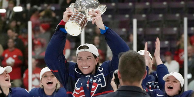 Hilary Knight hoists cup