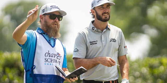 Max Homa with caddie Joe Greiner