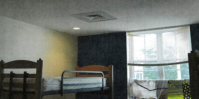 A vent is shown above a bunk bed in a bedroom.