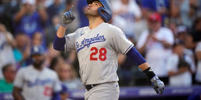 JD Martinez celebrates as he crosses home plate