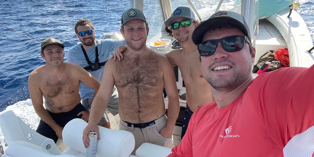 JE and friends on the boat