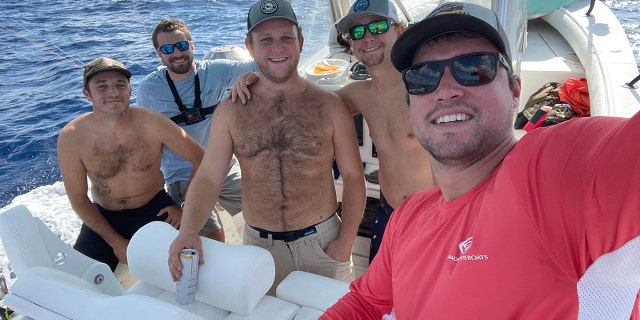 JE and friends on the boat