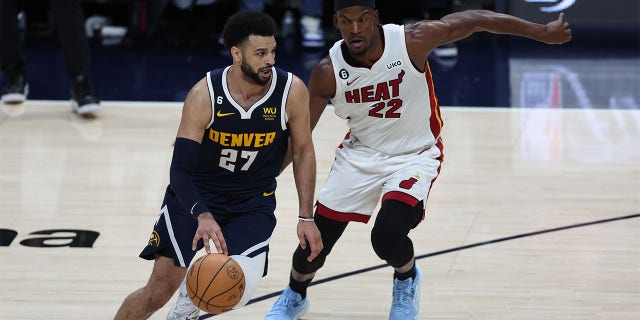 Jamal Murray dribbles the ball