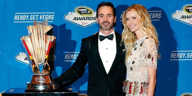 Jimmie Johnson and his wife Chandra pose for a picture