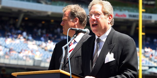 John Sterling at podium
