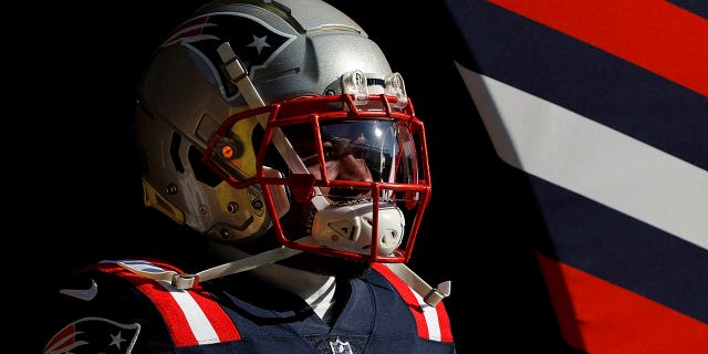 Jonathan Jones stands in the tunnel before a Patriots games in 2022