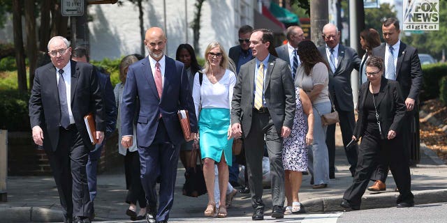 Holloway family and friends walking outside