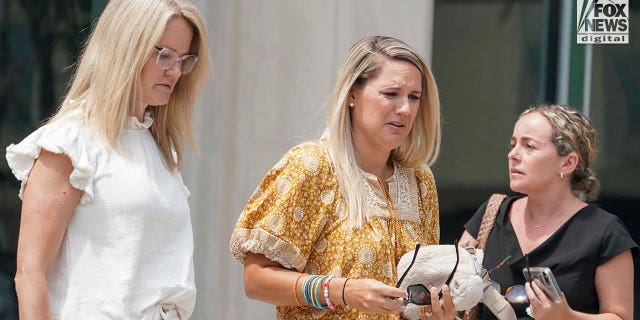 Friends and family of Natalie Holloway exit the federal courthouse