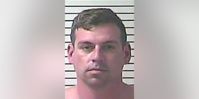 Mugshot of Jordan Mykol Henning.