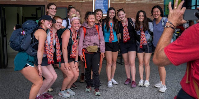 Kristin Harila takes a picture with tourists