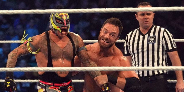 LA Knight vs Rey Mysterio in March