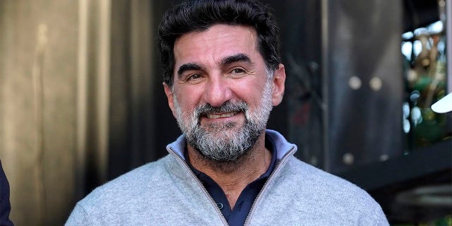 Yasir Al-Rumayyan walking