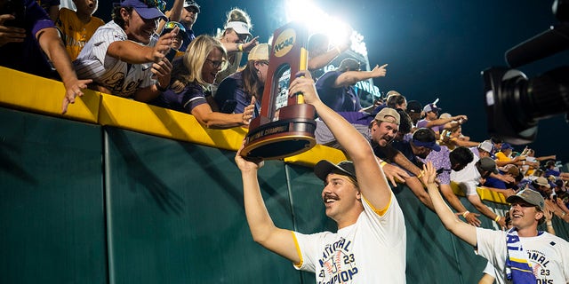 Paul Skenes greets fans with NCAA trophy