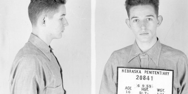Booking photo of William Leslie Arnold face first and in profile.