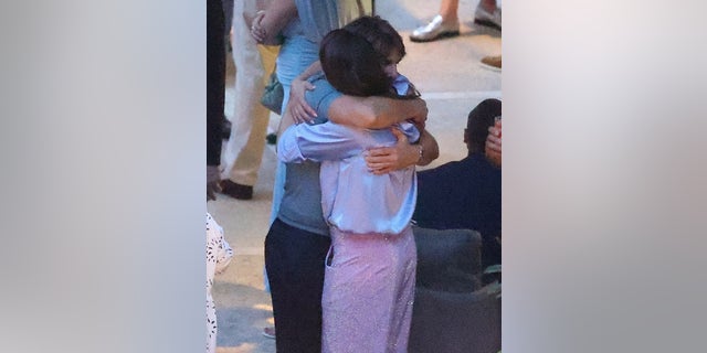 Tom Cruise hugs Hayley Atwell