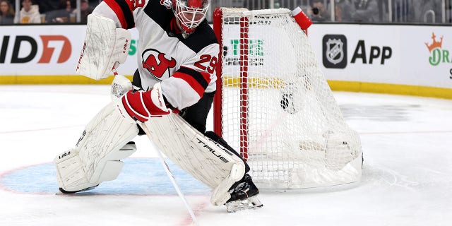 Mackenzie Blackwood plays puck