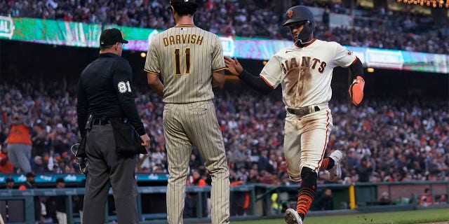 Luis Matos runs past Yu Darvish
