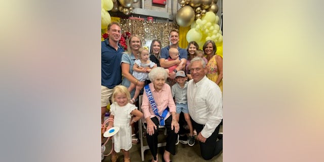 Melba surrounded by her numerous family members