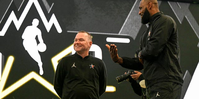 Michael Malone of the Denver Nuggets with LeBron James at the NBA All-Star game
