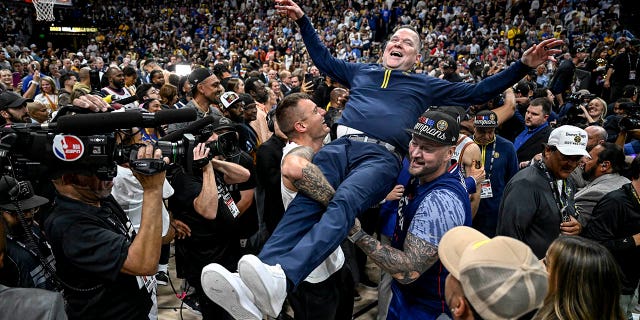 Michael Malone is carried