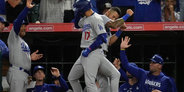 Miguel Vargas celebrates with David Peralta