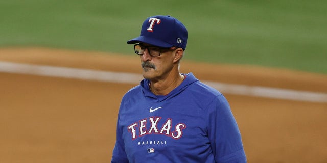 Mike Maddux walks on field