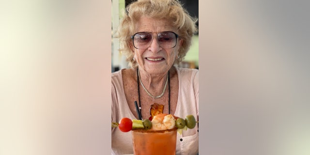 Mildred with cocktail
