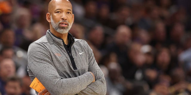 Monty Williams stands on sideline