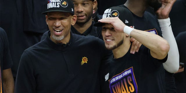 Monty Williams with Devin Booker