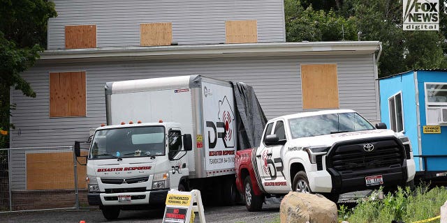 Trucks labeled Disaster Response parked in King Road driveway in Moscow idaho